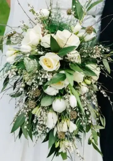 White cascading wedding bouquet for a bride. Rachel Ryan weddings photography